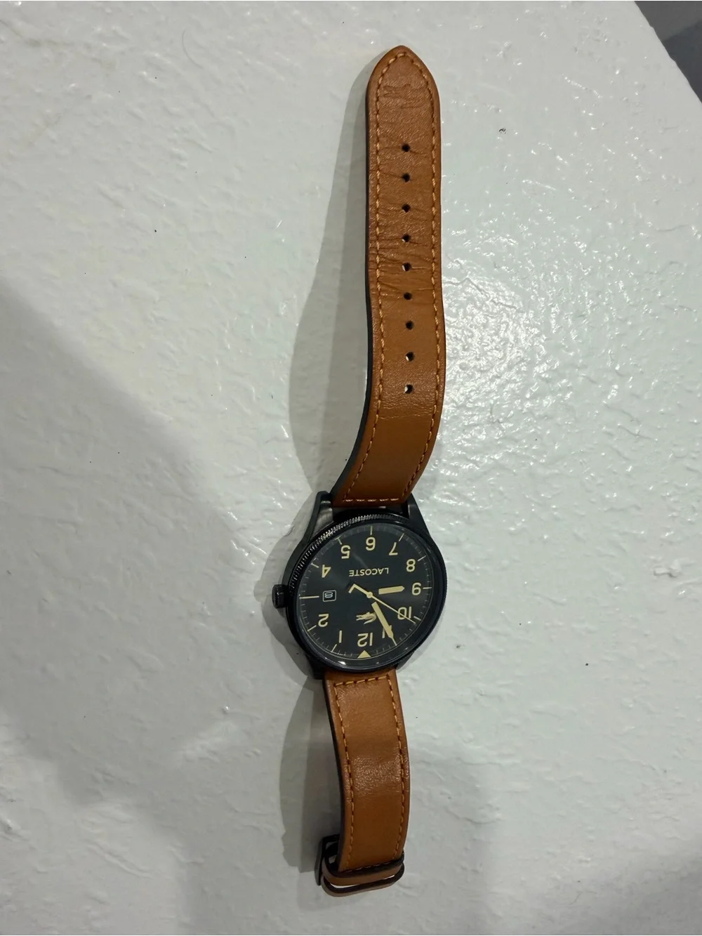 Lacoste Black Dial Watch with Tan Strap and Gold Accents
